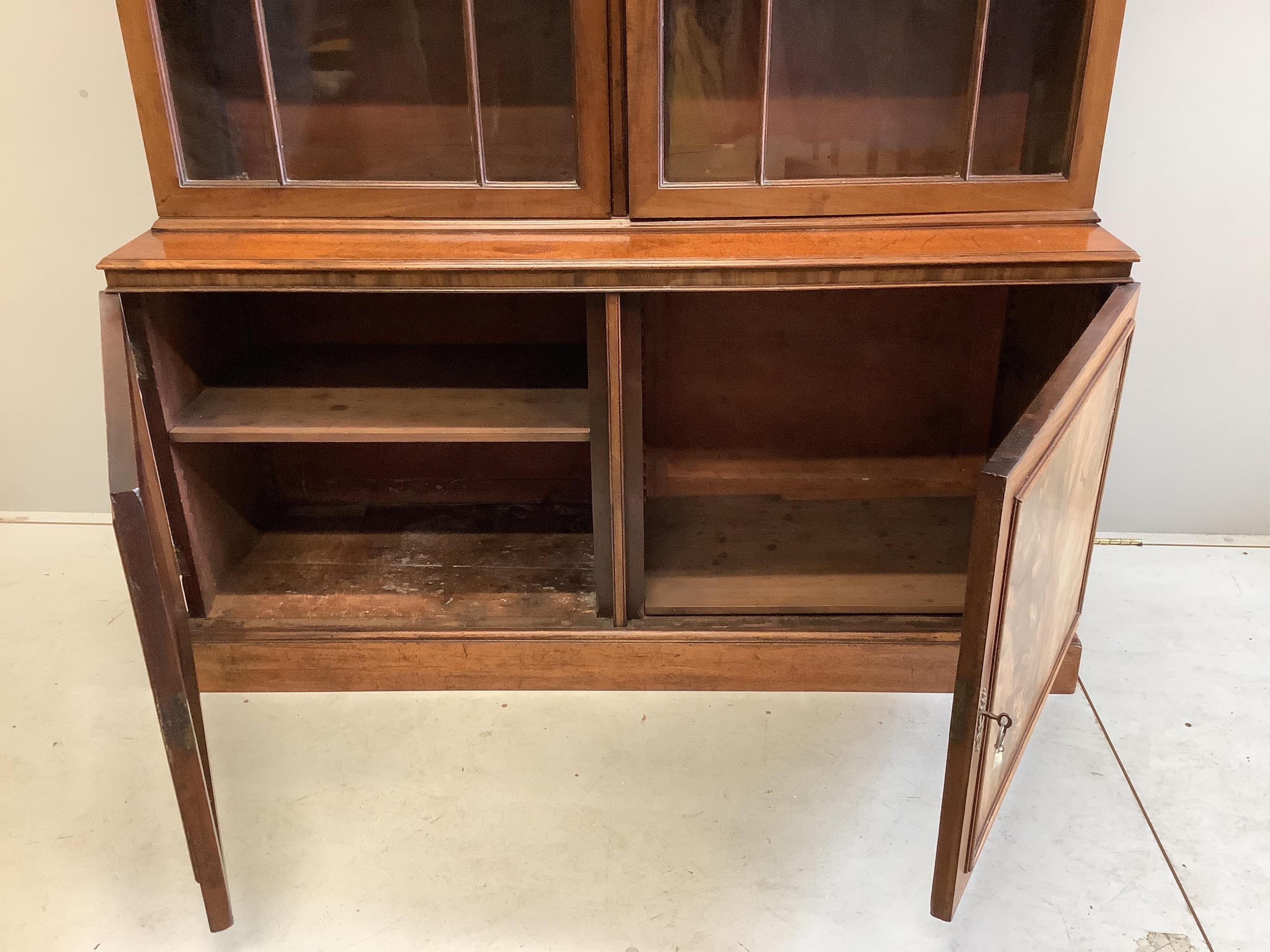 A George III mahogany bookcase, width 152cm, depth 47cm, height 203cm. Condition - fair to good